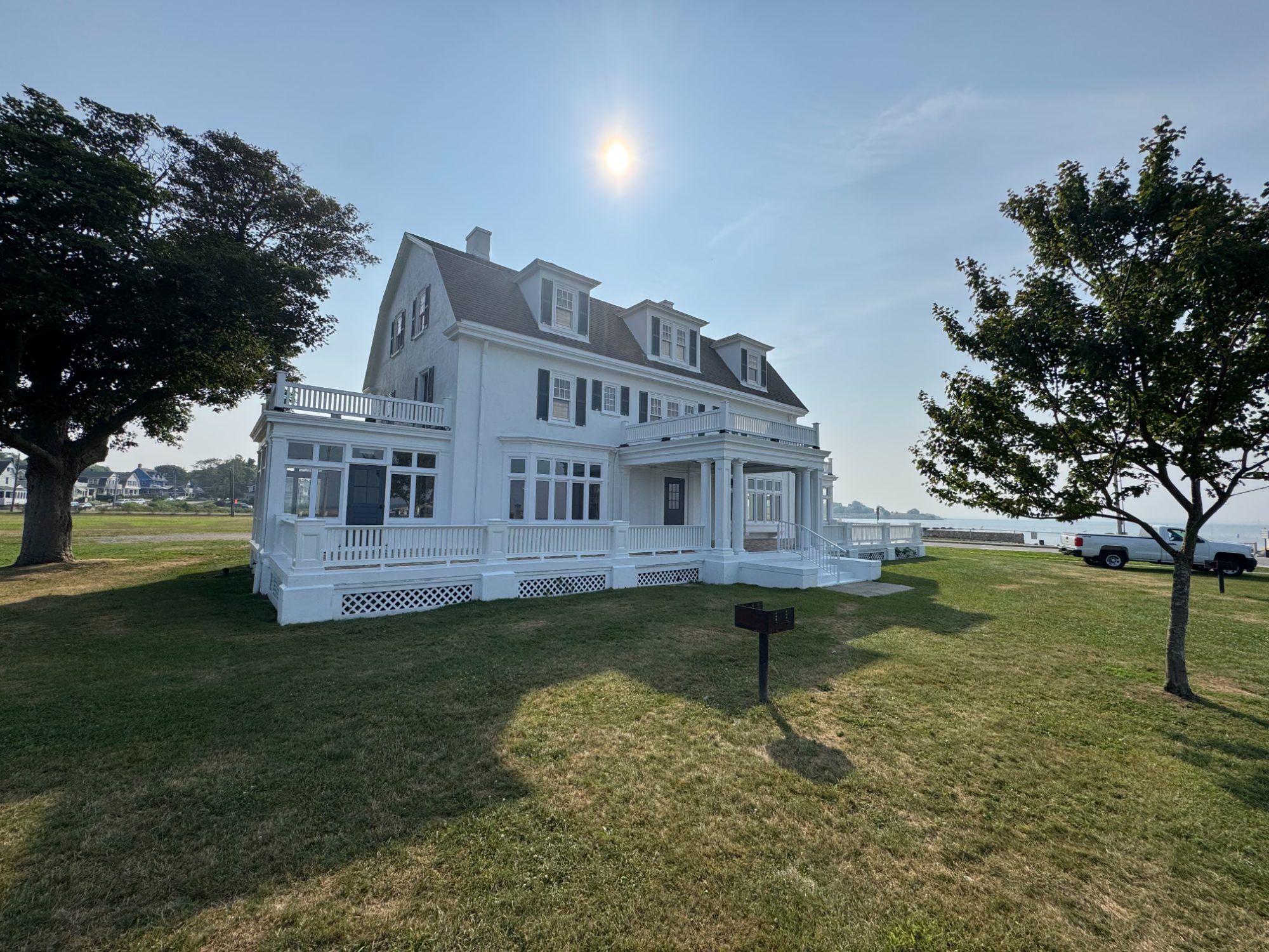 Side elevation of the restored Zbierski House with new porch railings and trim
